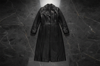 Black leather trench coat — flat lay overhead