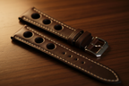 Dark brown rally perforated leather watch strap — 8K cinematic