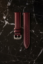 Burgundy red Saffiano leather watch strap — cinematic studio