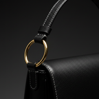 Black leather crossbody bag - strap detail