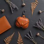Leather AirPods case - flat lay editorial