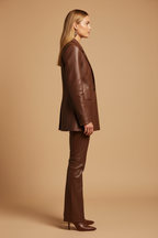 Women's brown leather blazer suit side profile