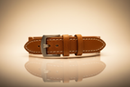 Tan cognac full-grain leather watch strap — cinematic studio shot
