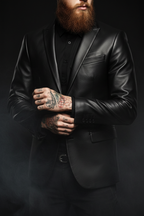 Men's black leather blazer upper body close-up