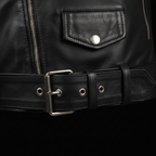 Men's black leather biker vest – belt buckle and studs close-up