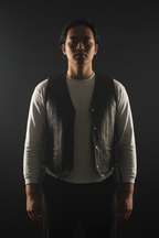 Men's distressed black leather snap vest – front pose