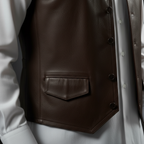 Brown leather vest – side pocket and waist close-up
